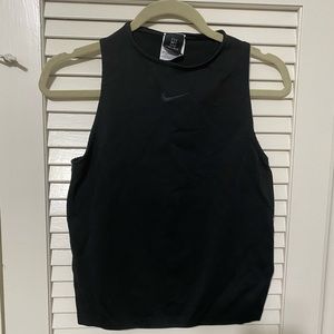 High-neck fitted Nike dry-fit shirt.